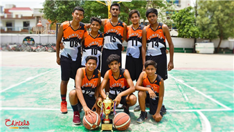 “The game (basketball) honors toughness” – Brad Stevens  At The Chintels School, Ratanlal Nagar, Sports is an integral part of the curriculum, and excelling at what we do makes us stand apart. The Basketball team added just another colour to its winning streak by lifting the winners trophy at the I.S.C. Inter-school (Kanpur South Zone) Basketball Tournament (Boys), which was held at the Mercy Memorial School. The tournament lasted for three days